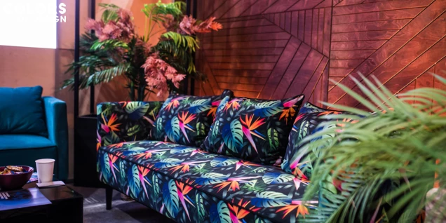 The tropical motif of TAMI sofas will warm up any arrangement!